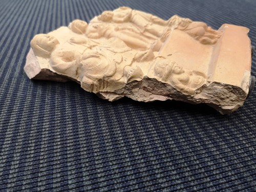 Lot 199 - A Chinese pottery fragmentary architectural tile, perhaps Tang Dynasty