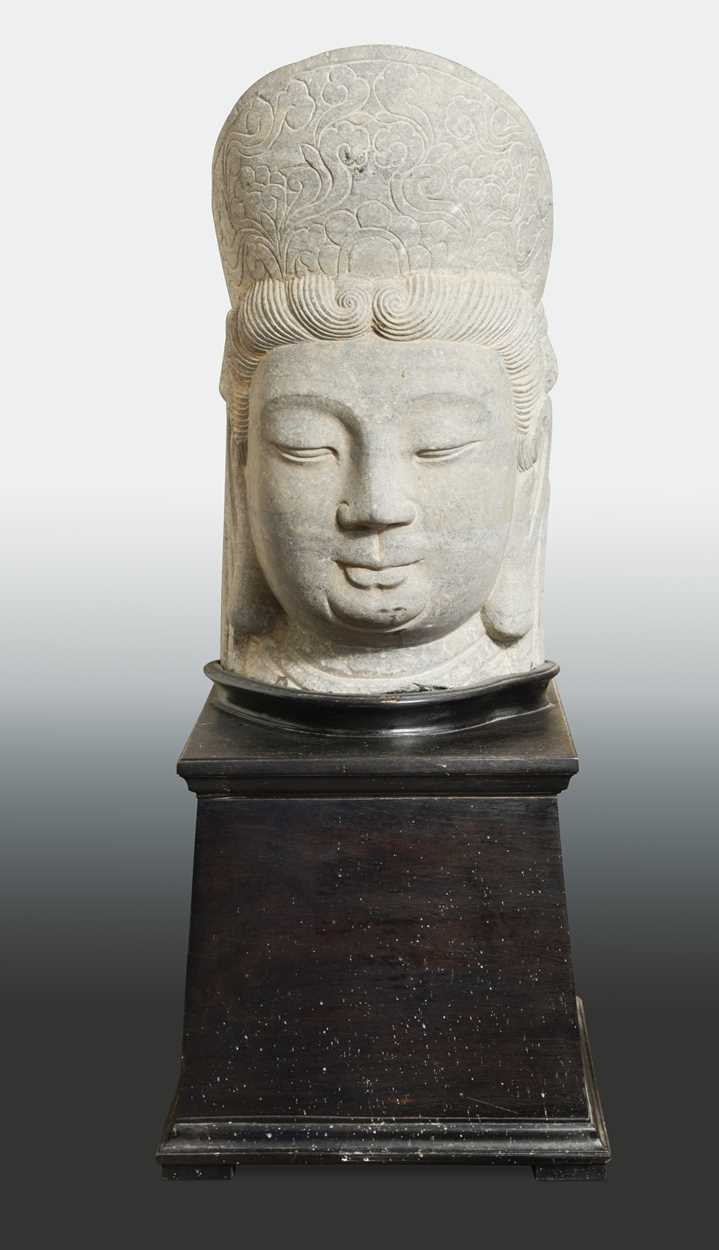 Lot 235 - A Chinese limestone head of Avalokiteshvara