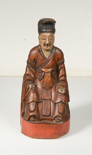 Lot 79 - A Chinese carved and painted wooden figure of an ancestor, 19th century