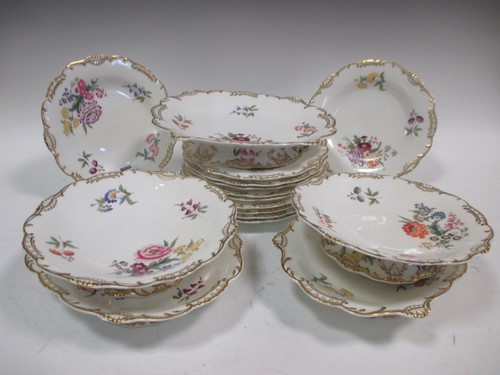 Lot 192 - A part dessert service, with floral decoration,...