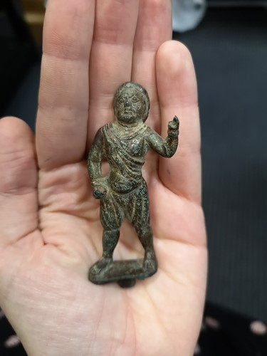 Lot 298 - A Chinese gilt bronze figure of a helmeted man, possibly 10th century