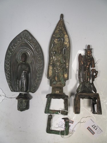 Lot 137 - Three Chinese bronze and gilt bronze standing...
