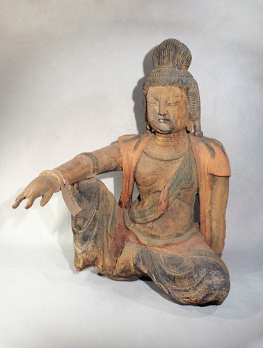 Lot 75 - A Chinese carved and polychrome painted wood...