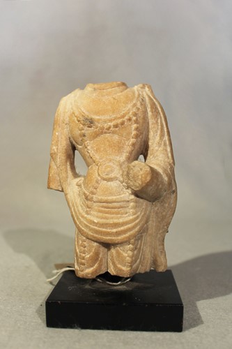 Lot 89 - A Chinese white marble fragmentary torso of...