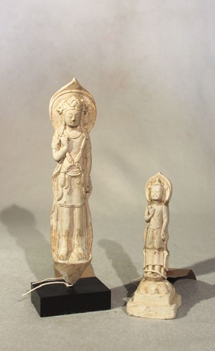 Lot 127 - A Chinese stucco figure of Guanyin standing,...