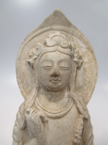 Lot 127 - A Chinese stucco figure of Guanyin standing,...