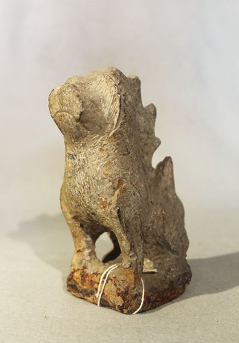 Lot 131 - A Chinese grey stone seated Fo dog, with...
