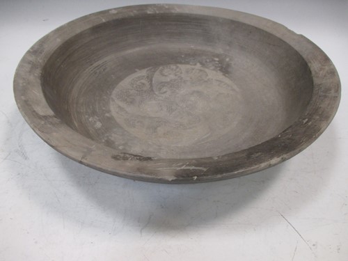Lot 63 - A Chinese large grey pottery circular dish,...