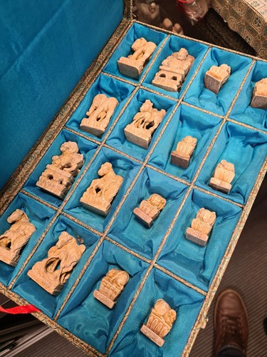 Lot 125 - A Chinese carved soapstone chess set,...