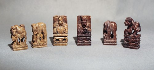 Lot 125 - A Chinese carved soapstone chess set,...