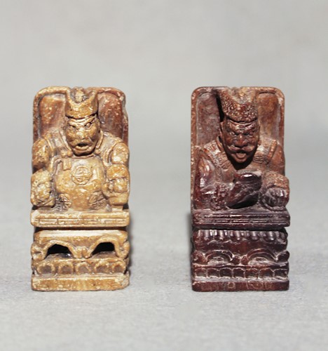 Lot 125 - A Chinese carved soapstone chess set,...