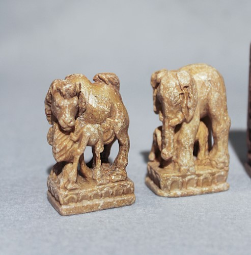 Lot 125 - A Chinese carved soapstone chess set,...