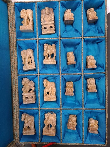 Lot 125 - A Chinese carved soapstone chess set,...