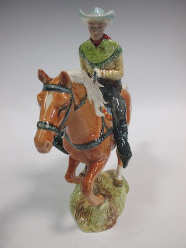 Lot 12 - A Beswick model of a cowboy, 23cm high