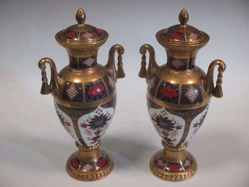 Lot 5 - A pair of Royal Crown Derby 1128 pattern...
