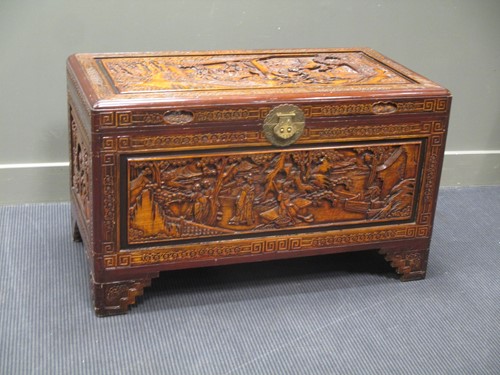Lot 730 - A Chinese carved and stained wood chest or...