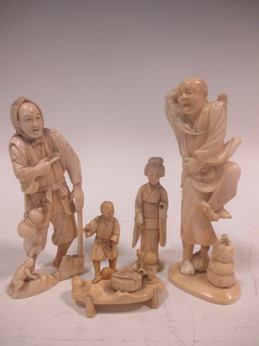 Lot 136 - Ivory figure group