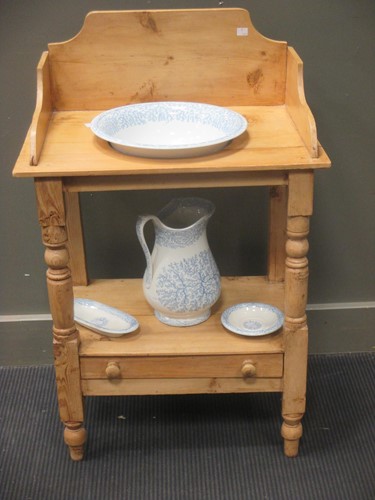 Lot 722 - A stripped pine washstand with blue and white...