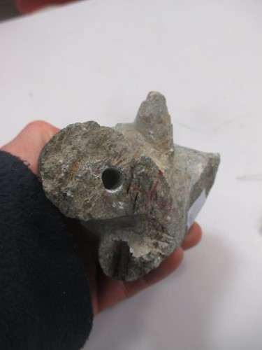 Lot 18 - A grey stone head of a Bodhisattva, 11cm high...