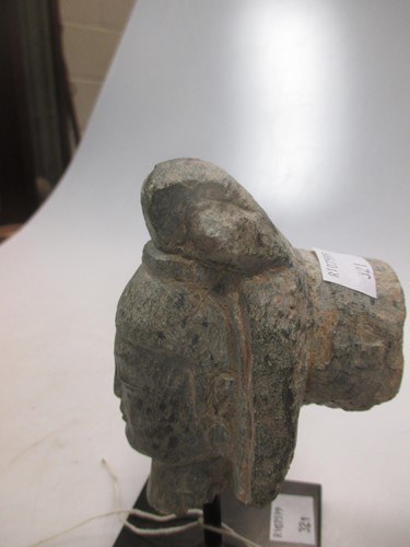 Lot 18 - A grey stone head of a Bodhisattva, 11cm high...