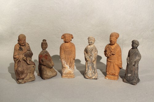 Lot 61 - Six Chinese pottery figures, Han Dynasty or...