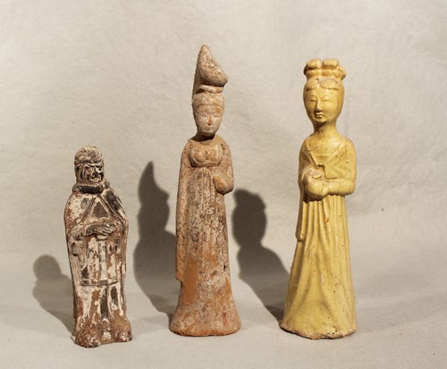 Lot 53 - Three Chinese pottery figures, probably Sui...