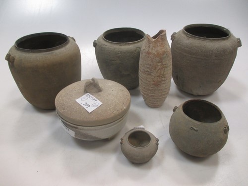 Lot 118 - Seven Chinese ceramic small vessels, Han...