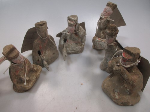 Lot 59 - A group of six Chinese painted pottery tomb...