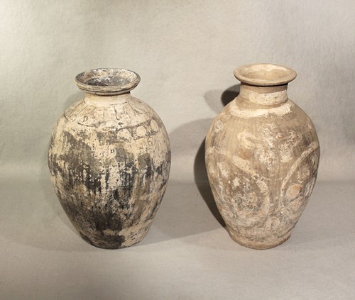Lot 54 - Two Chinese pottery ovoid vases painted with...