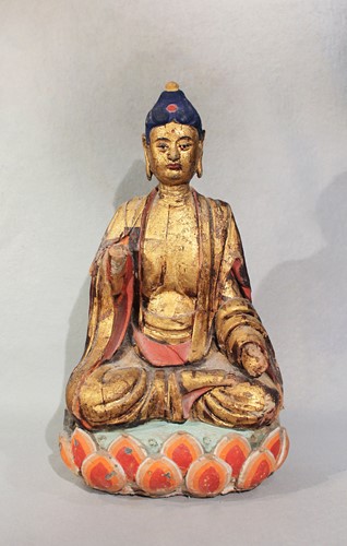 Lot 113 - A Chinese Pottery/straw mix figure of Buddha...