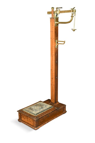 Lot 444 - A set of brass and oak weighing scales by W & T Avery Ltd.