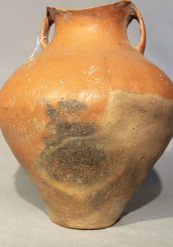 Lot 76 - A Chinese red pottery shouldered vase with...