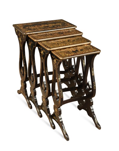 Lot 928 - A nest of four black and gilt lacquer occasional tables