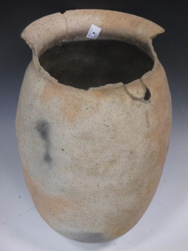Lot 143 - A Chinese pottery vase, incised surface,...