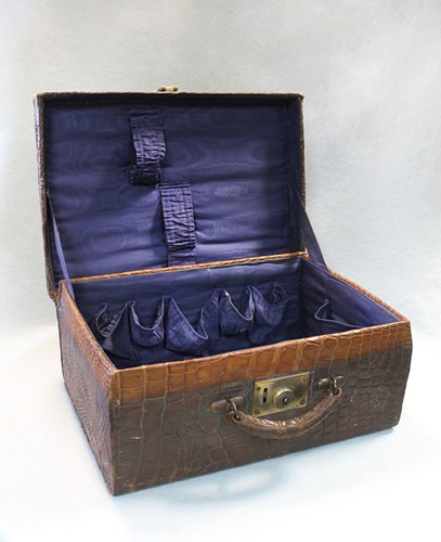 Lot 284 - An early 20th century crocodile leather dressing case