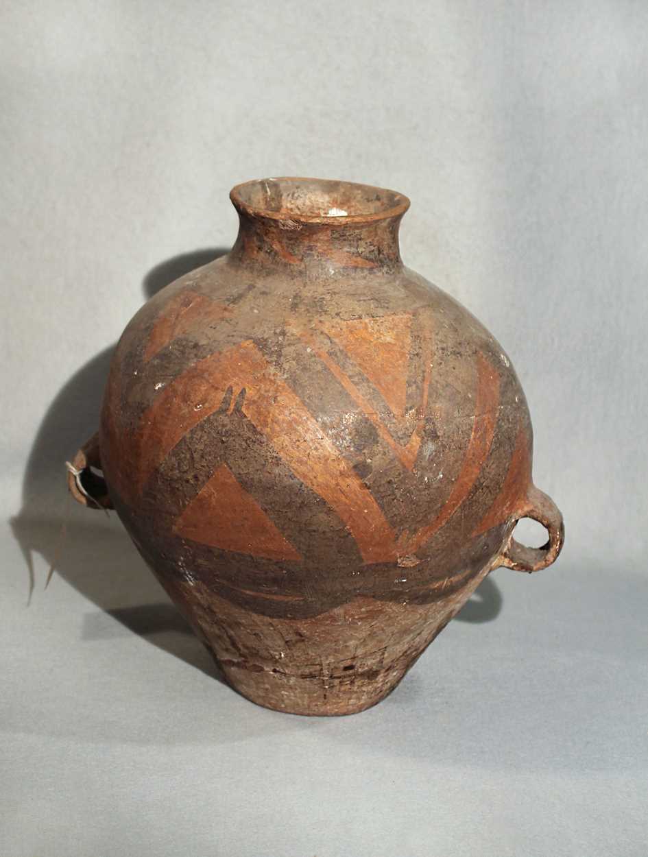 Lot 110 - A Chinese Neolithic painted pottery storage...