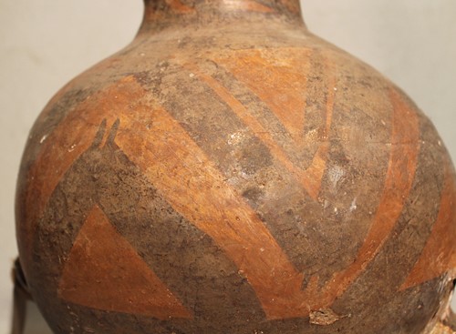 Lot 110 - A Chinese Neolithic painted pottery storage...
