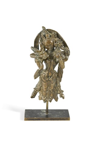 Lot 374 - A West Tibetan fragmentary bronze figure of the four armed deity Chenrezig, 16th/17th century