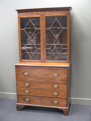 Lot 620 - A 19th century mahogany secretaire bureau...