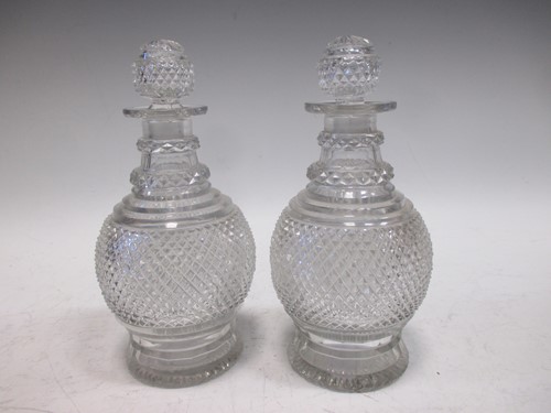 Lot 56 - A pair of regency cut glass half size decanters