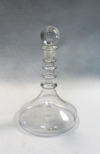 Lot 24 - A George III ring necked ships decanter and stopper, circa 1780