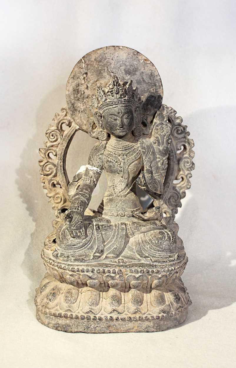 Lot 393 - A carved Grey Stone Tara in 16th century style,  Chinese in Nepalese taste