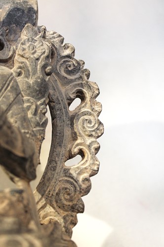 Lot 393 - A carved Grey Stone Tara in 16th century style,  Chinese in Nepalese taste
