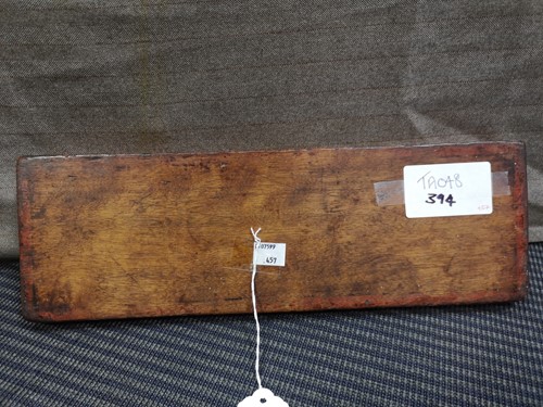 Lot 394 - A Tibetan carved wood manuscript cover, 14th/15th century or later