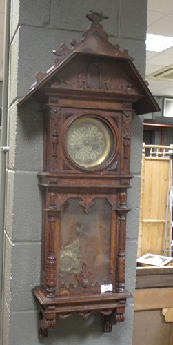 Lot 201 - A late 19th century oak cased 8 day wall clock