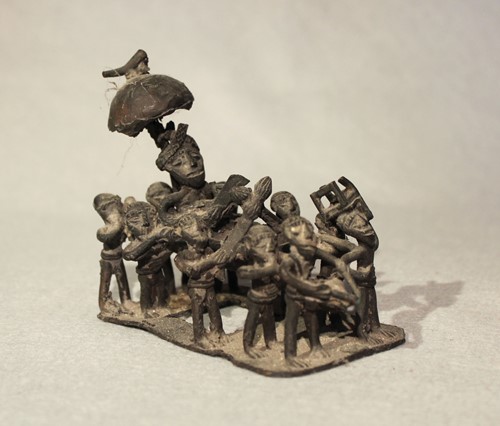 Lot 92 - A West African bronze small group, of a chief...