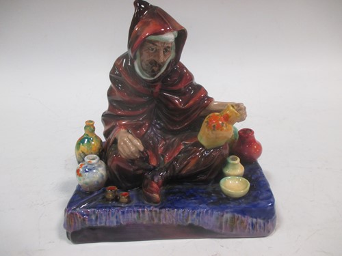 Lot 33 - A Royal Doulton 'The Potter' figurine