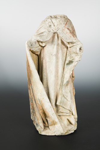 Lot 419 - A French carved limestone torso fragment of an enrobed bishop saint, probably Burgundy, circa 1450-1500