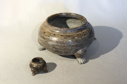 Lot 88 - Two Chinese green puddingstone plain...