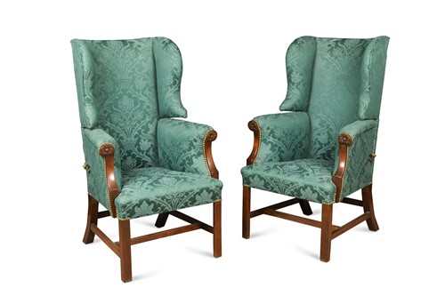 Lot 944 - A pair of mahogany ratchet-back wing armchairs, late 18th/early 19th century